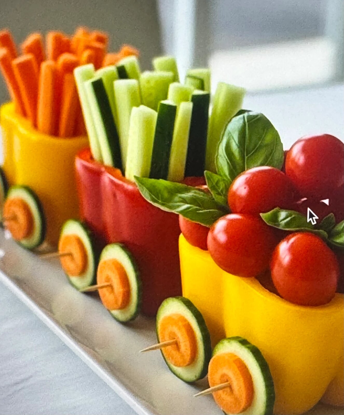 Crudités served in pepper carriages as a vegetable train